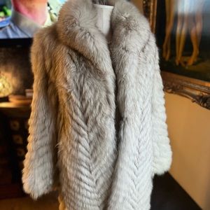 Long saga fox fur coat